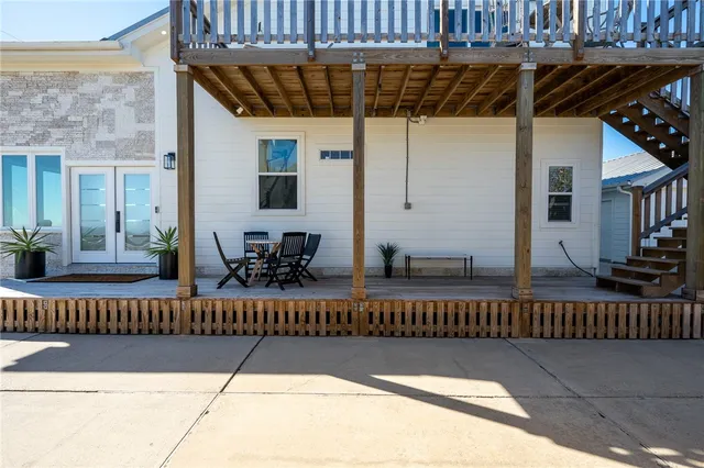 a view of balcony with small potted plants