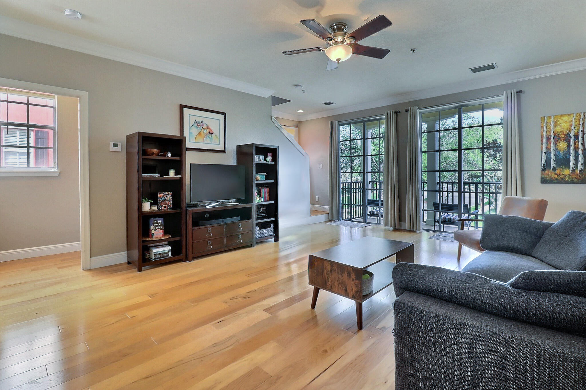 216 Quarry Knoll Way Jupiter, FL 33458 - Photo 11 of 23 a living room with furniture and a flat screen tv