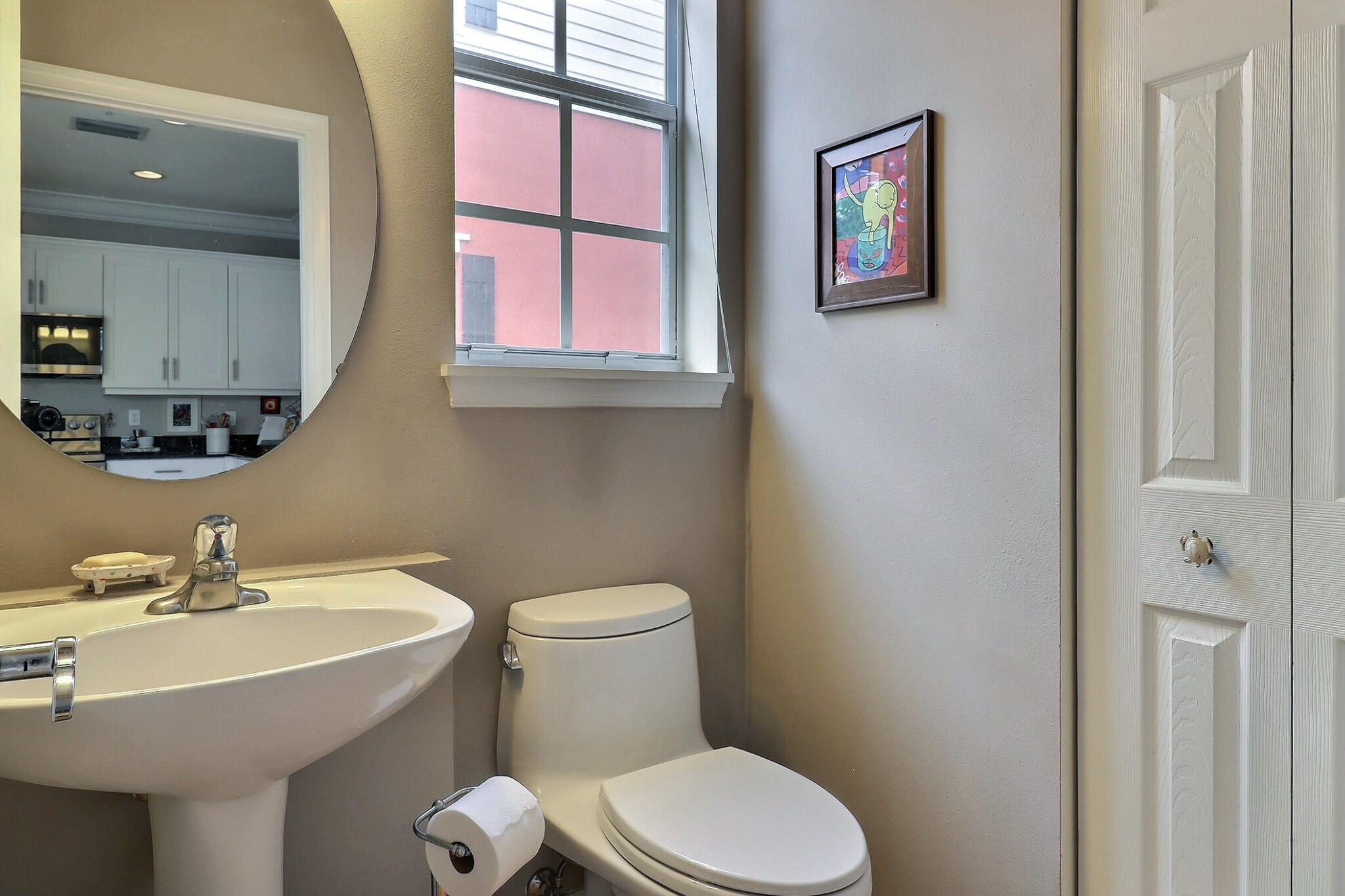 216 Quarry Knoll Way Jupiter, FL 33458 - Photo 13 of 23 a bathroom with a toilet sink and mirror