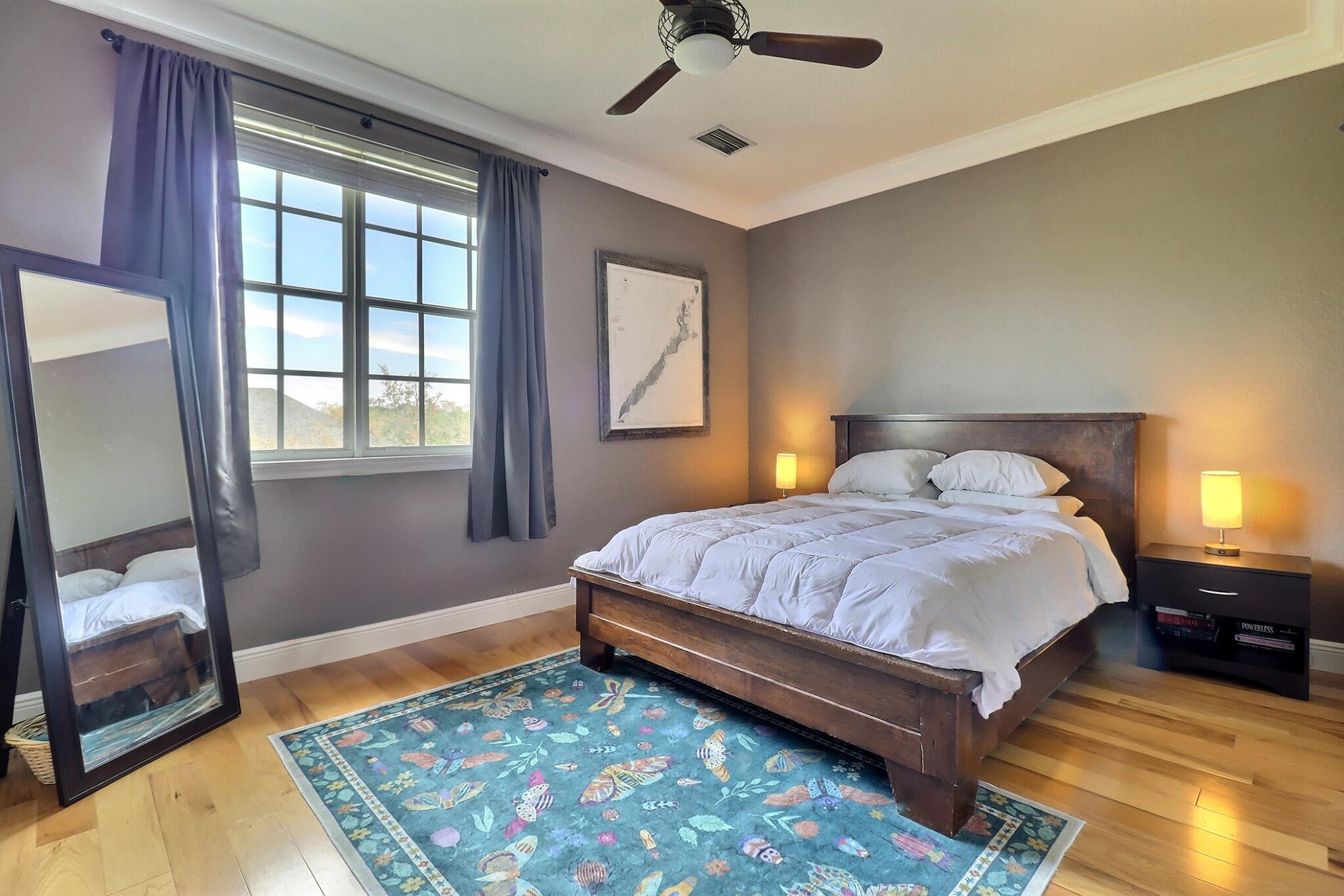 216 Quarry Knoll Way Jupiter, FL 33458 - Photo 17 of 23 a bedroom with a bed and a flat tv screen on the dresser