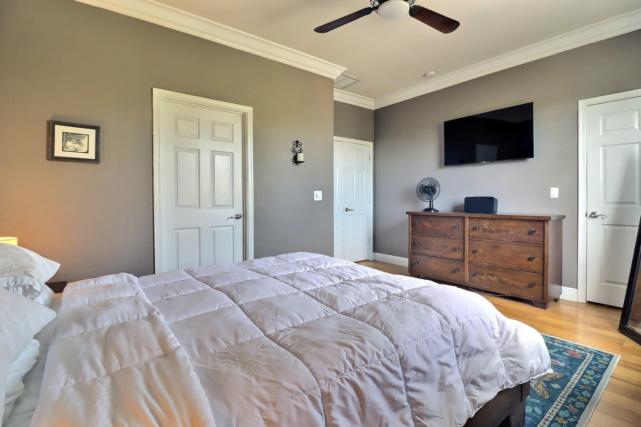 216 Quarry Knoll Way Jupiter, FL 33458 - Photo 18 of 23 a bedroom with a bed and a flat screen television