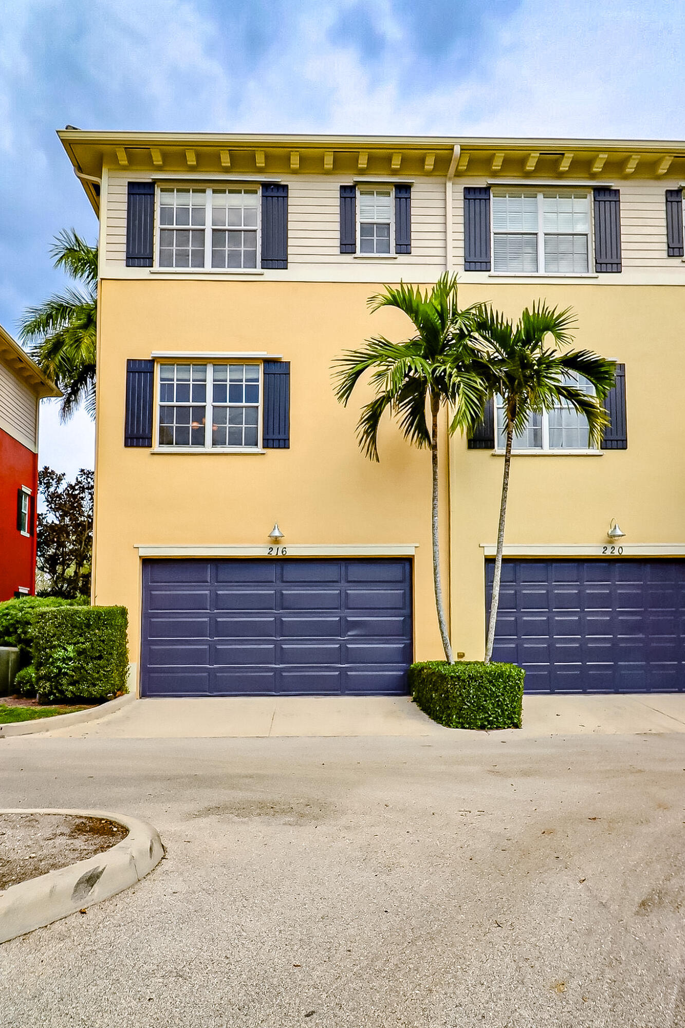 216 Quarry Knoll Way Jupiter, FL 33458 - Photo 23 of 23 a view of a house with a yard and a garage