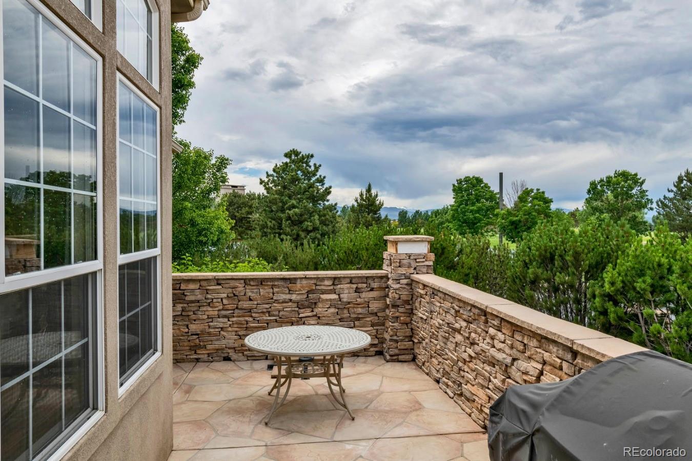 8974 Old Tom Morris Circle Highlands Ranch, CO 80129 - Photo 11 of 28 a view of an outdoor sitting area with furniture