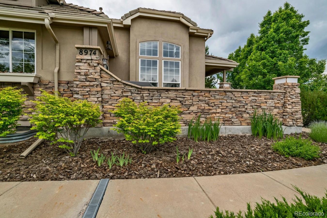 8974 Old Tom Morris Circle Highlands Ranch, CO 80129 - Photo 12 of 28 front view of a house