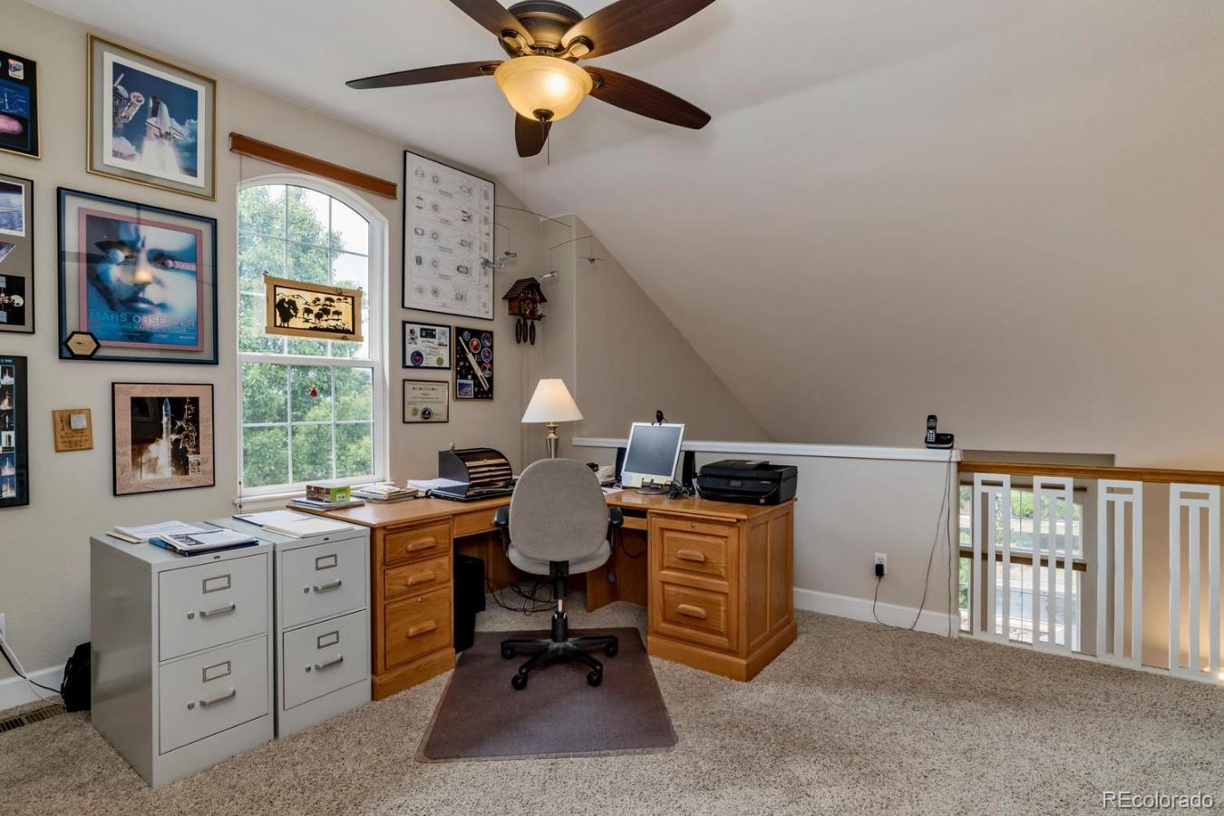8974 Old Tom Morris Circle Highlands Ranch, CO 80129 - Photo 20 of 28 a view of workspace with workspace and windows