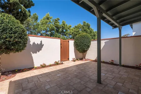 a view of backyard with a small cabin