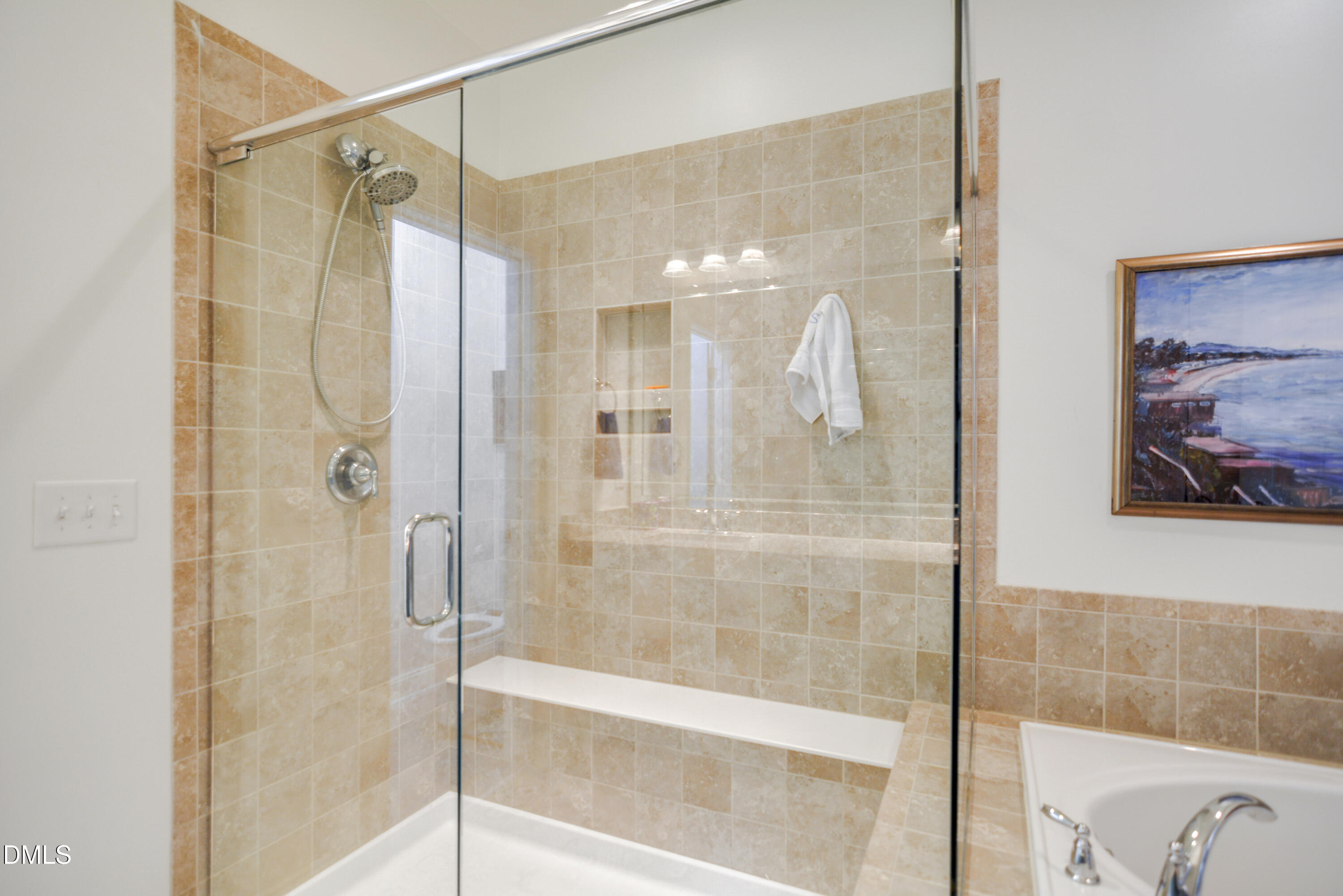2408 Noble Road Raleigh, NC 27608 - Photo 18 of 25 a bathroom with a glass shower door