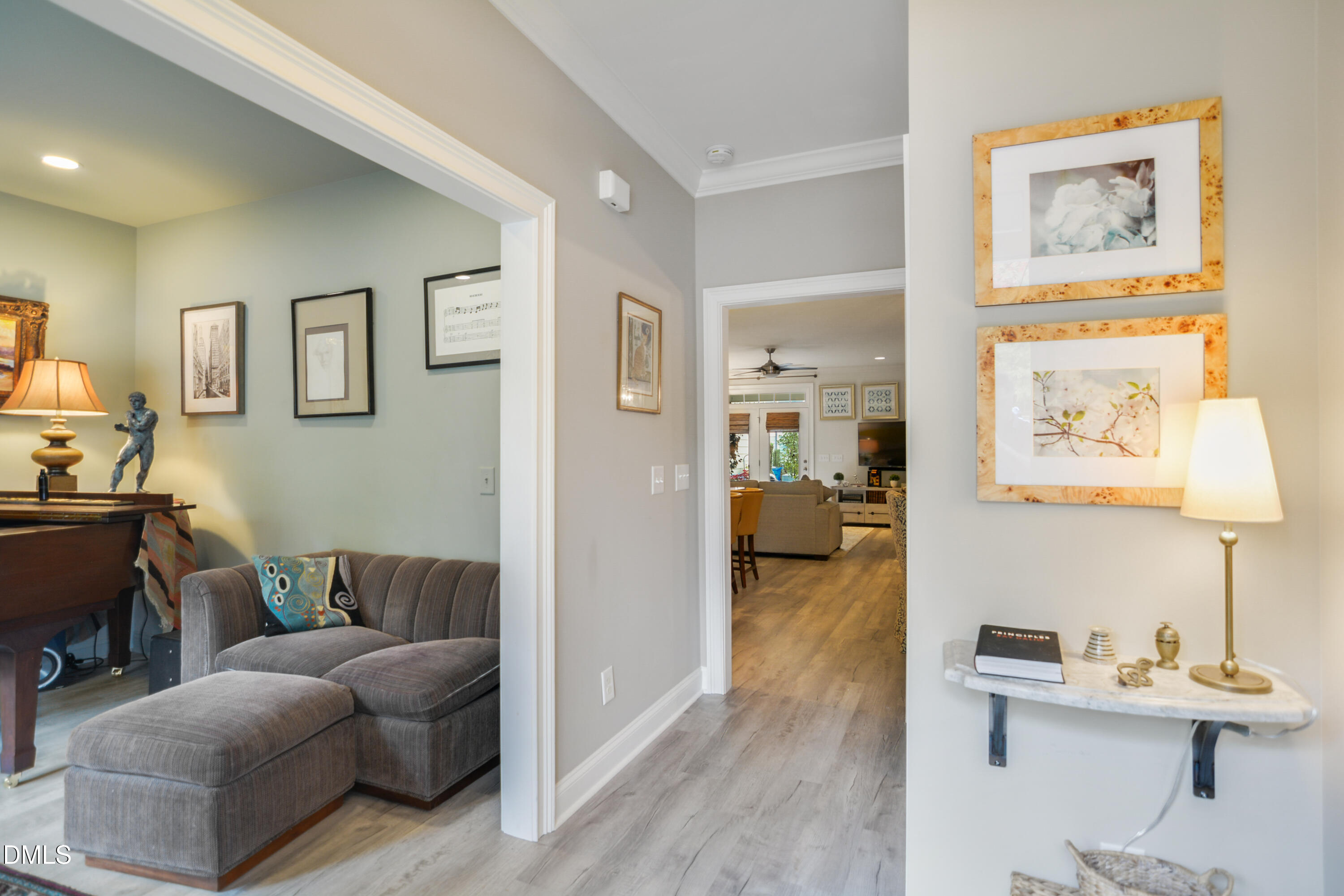 2408 Noble Road Raleigh, NC 27608 - Photo 3 of 25 a living room with furniture and a wooden floor
