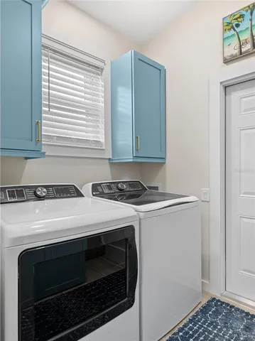 a stove top oven sitting inside of a kitchen