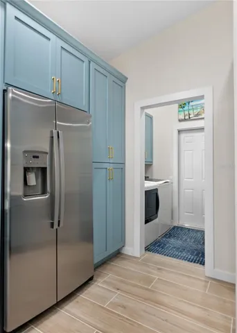 a bathroom with a shower and a sink