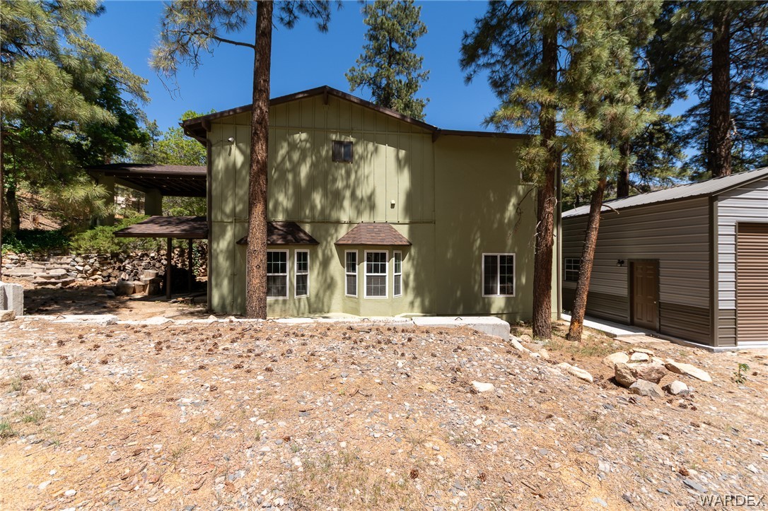 6615 Flag Mine Road Kingman, AZ 86401 - Photo 54 of 72 a front view of a house with a yard