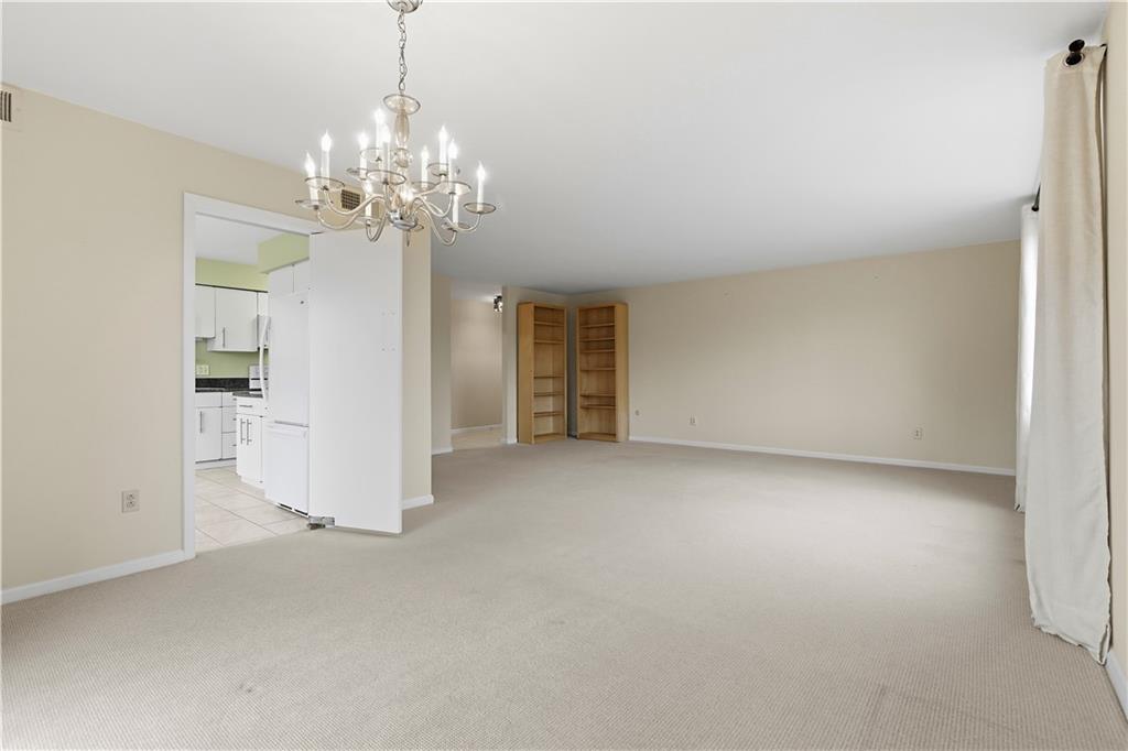 220 North Dithridge Street, Unit 805 Pittsburgh, PA 15213 - Photo 12 of 40 a view of a chandelier in big room and chandelier