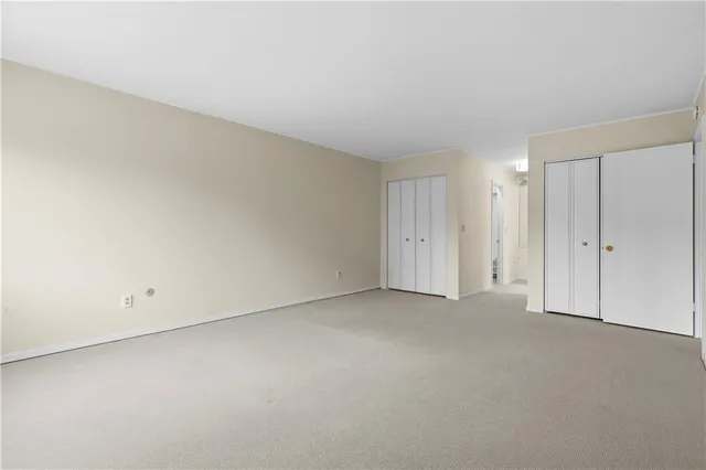 an empty room with an entryway