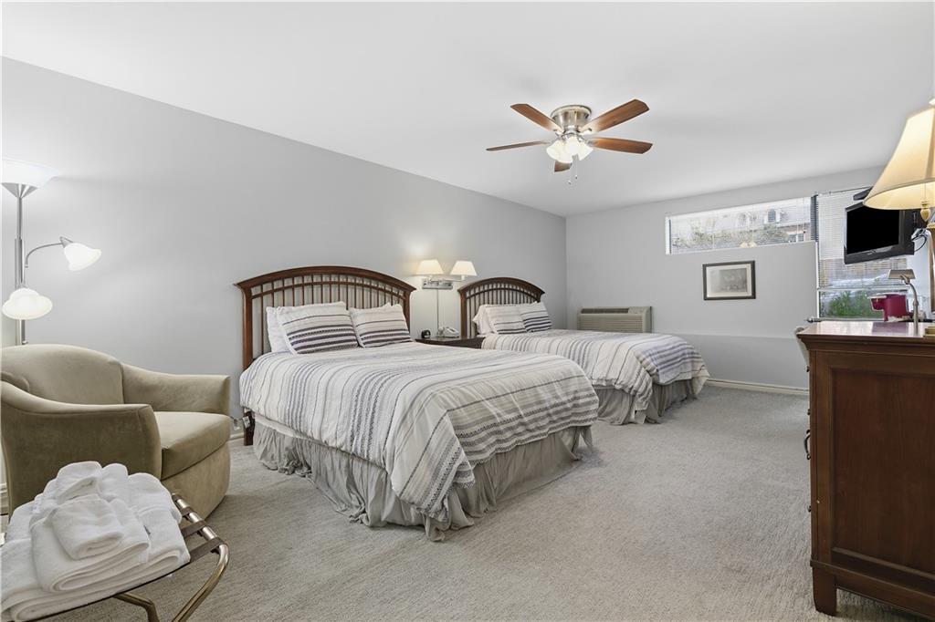 220 North Dithridge Street, Unit 805 Pittsburgh, PA 15213 - Photo 40 of 40 a bedroom with a bed and furniture