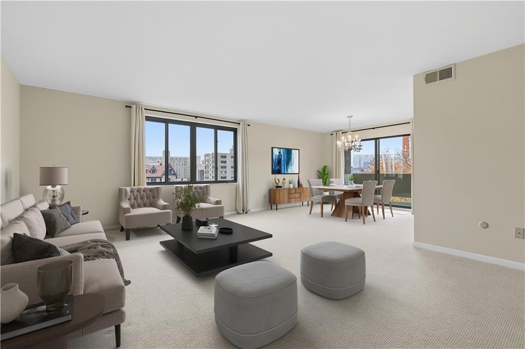 220 North Dithridge Street, Unit 805 Pittsburgh, PA 15213 - Photo 6 of 40 a living room with furniture and a large window