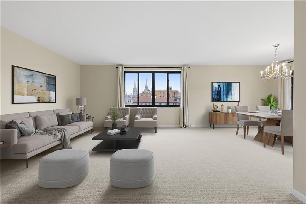 220 North Dithridge Street, Unit 805 Pittsburgh, PA 15213 - Photo 8 of 40 a living room with furniture and a large window