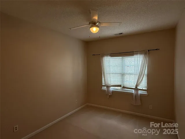 a view of a walk in closet