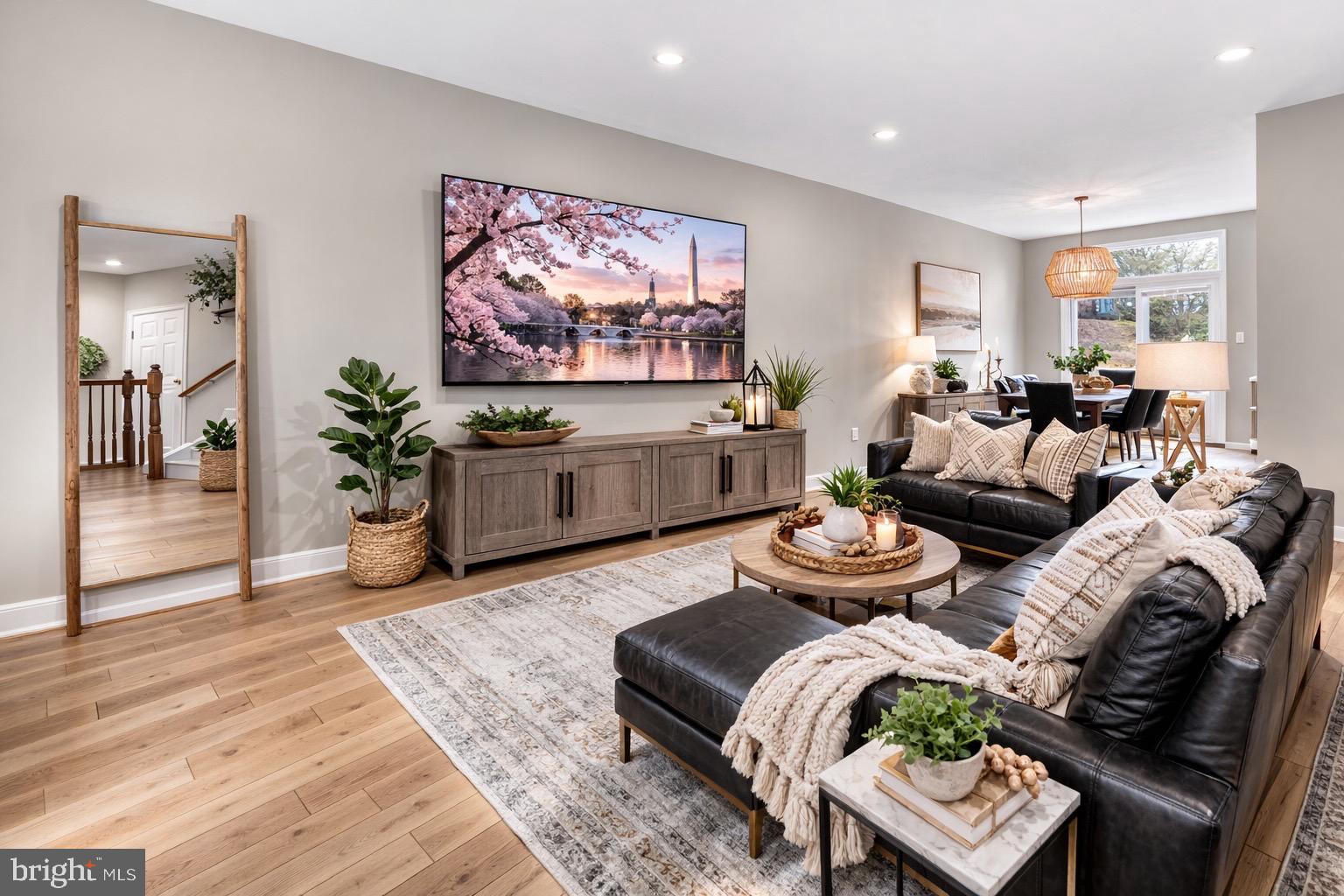 8713 Wadebrook Terrace Springfield, VA 22153 - Photo 8 of 21 a living room with furniture and wooden floor