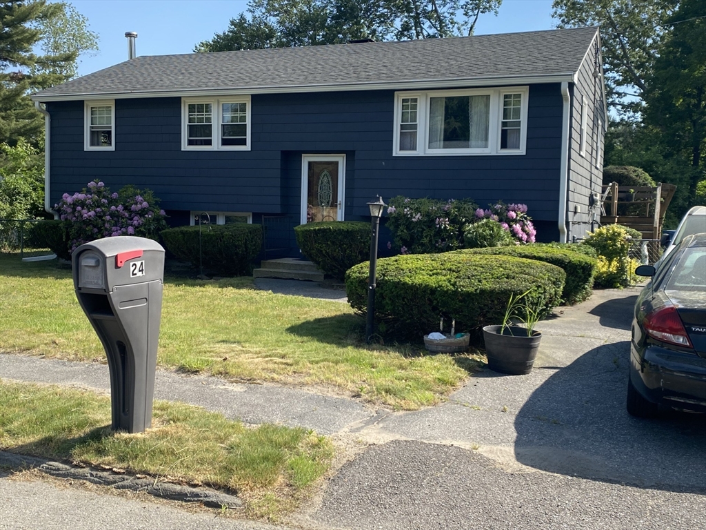 24 Harjean Road Billerica, MA 01821 - Photo 1 of 1 a front view of a house with garden