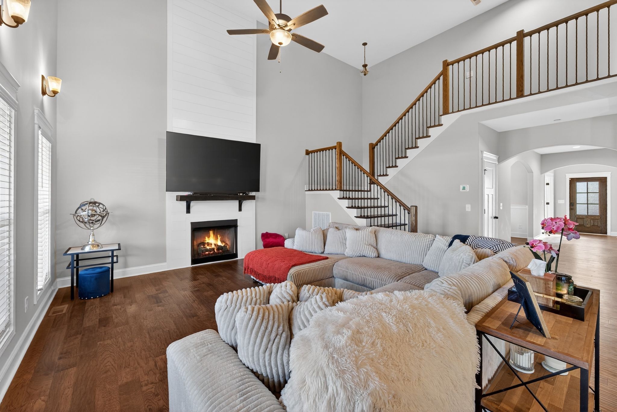308 Young Lane Pleasant View, TN 37146 - Photo 6 of 18 a living room with furniture a flat screen tv and a fireplace
