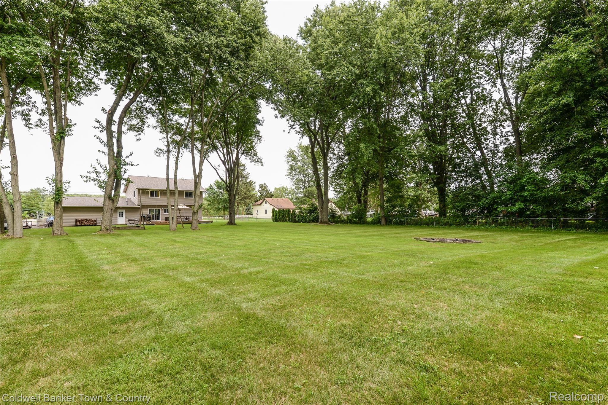 28721 Haas Road New Hudson, MI 48165 - Photo 12 of 28 Backyard