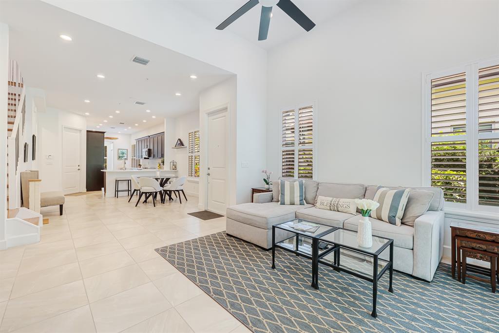 22954 Clear Echo Drive, Unit 31 Boca Raton, FL 33433 - Photo 15 of 44 a living room with furniture and a large window