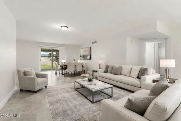 a living room with furniture and a couch