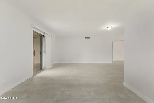 a kitchen with stainless steel appliances a refrigerator stove microwave and sink
