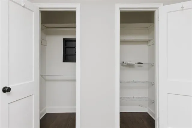 a bathroom with a walk in closet