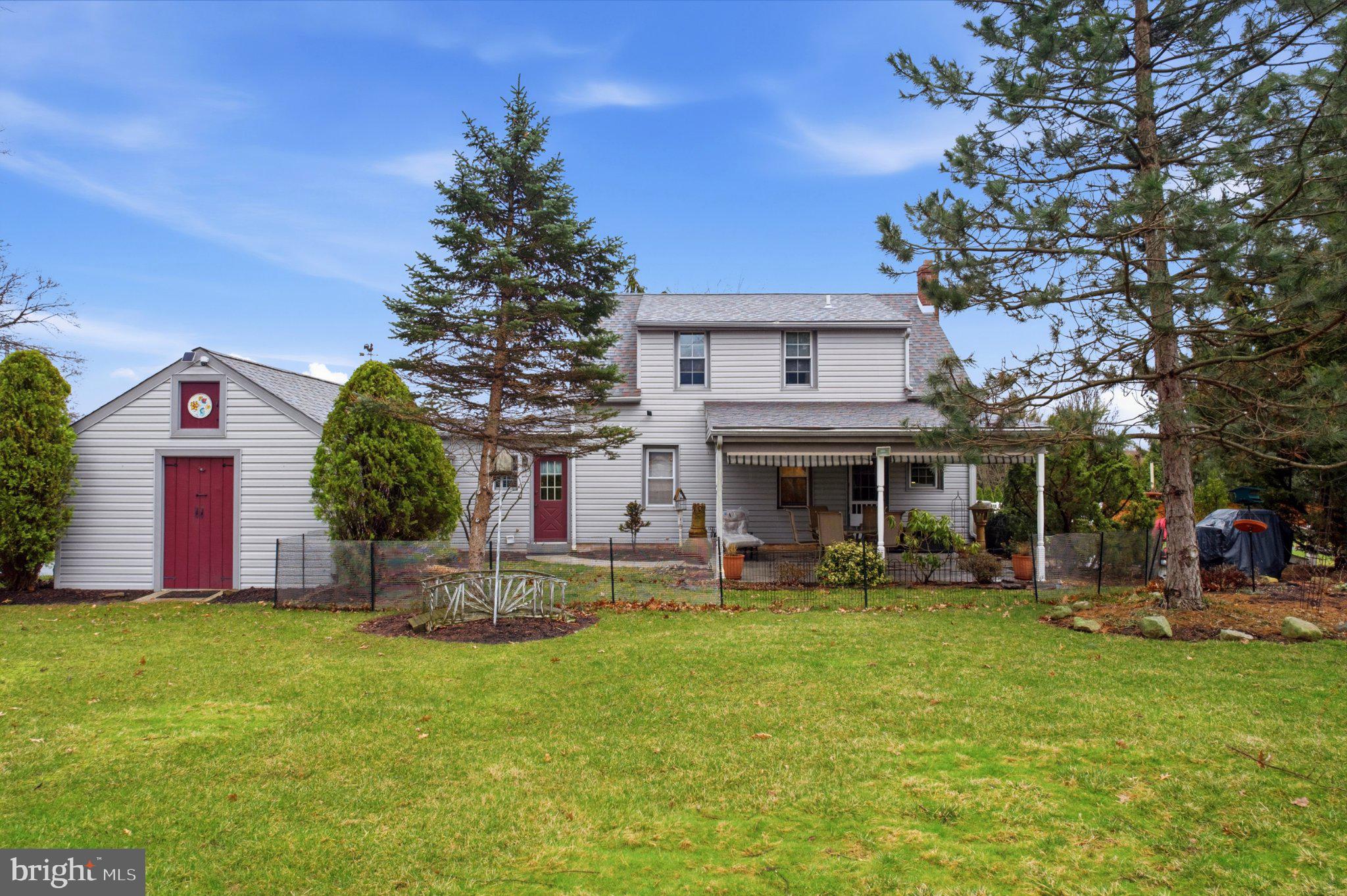 115 Church Road Telford, PA 18969 - Photo 27 of 29 Charming home with lush green yard.
