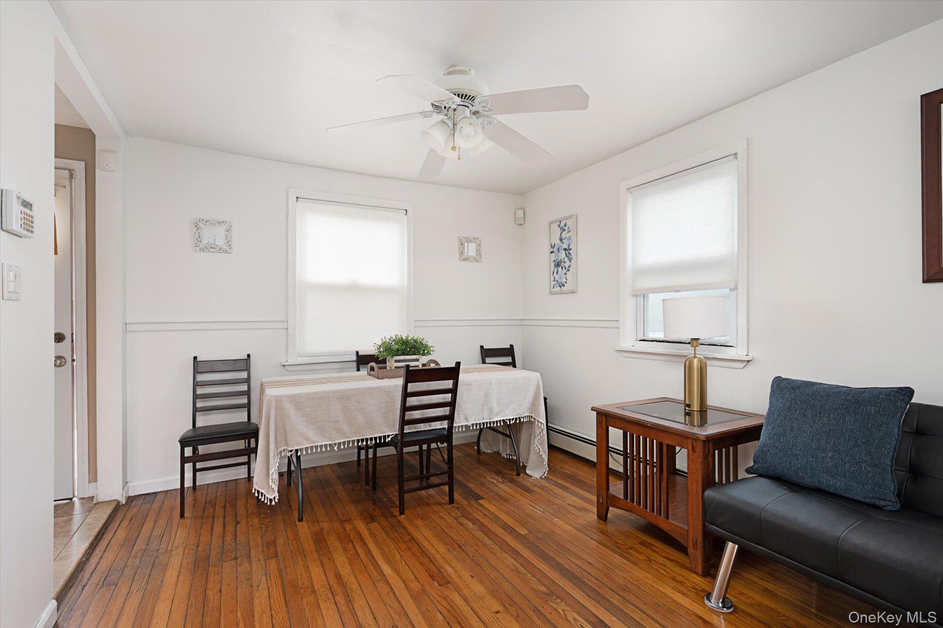 675 Little E Neck Road West Babylon, NY 11704 - Photo 5 of 20 a view of a livingroom with furniture and a window
