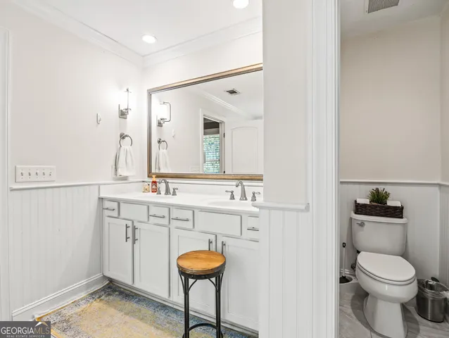 a bathroom with a tub sink and a shower