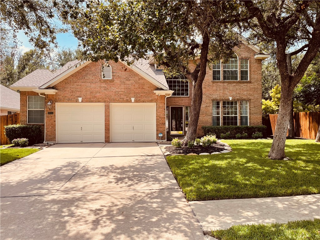 1411 Hunter Ace Way Cedar Park, TX 78613 - Photo 1 of 1 a front view of a house with yard