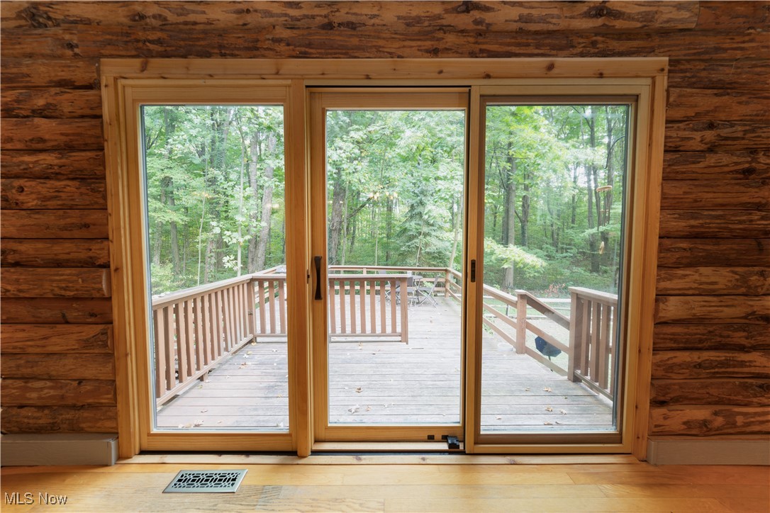 16535 Messenger Road Chagrin Falls, OH 44023 - Photo 17 of 37 Beautiful new 9 ft Pella slider in morning room showcasing back deck