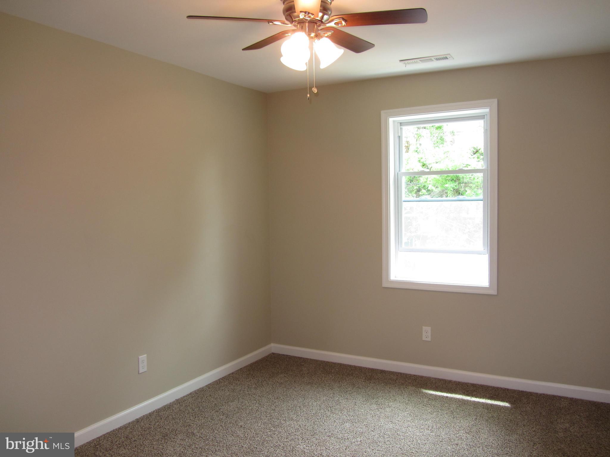 1645 Northgate Road Baltimore, MD 21218 - Photo 12 of 23 an empty room with a window