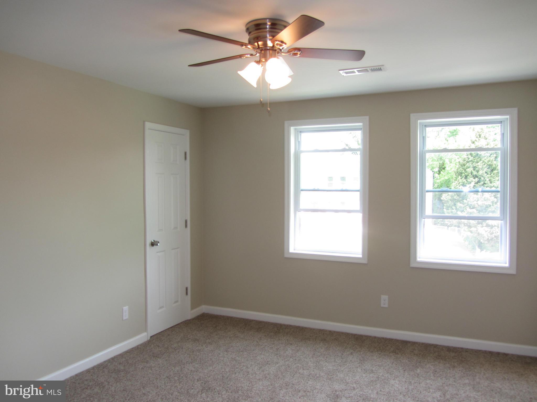 1645 Northgate Road Baltimore, MD 21218 - Photo 9 of 23 a view of an empty room with a window