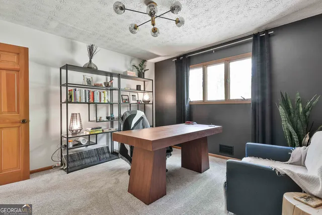 a bathroom with a toilet sink and a mirror