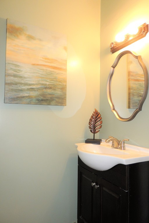 73 Crystal Avenue Springfield, MA 01108 - Photo 11 of 30 a bathroom with a sink and a mirror