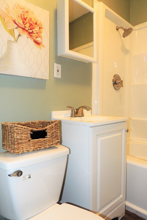 73 Crystal Avenue Springfield, MA 01108 - Photo 23 of 30 a bathroom with a sink and a mirror