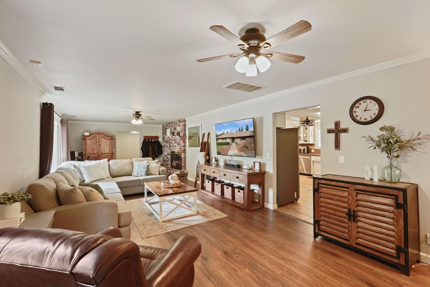 12963 Spring Time Lane Galt, CA 95632 - Photo 13 of 49 a living room with furniture and wooden floor