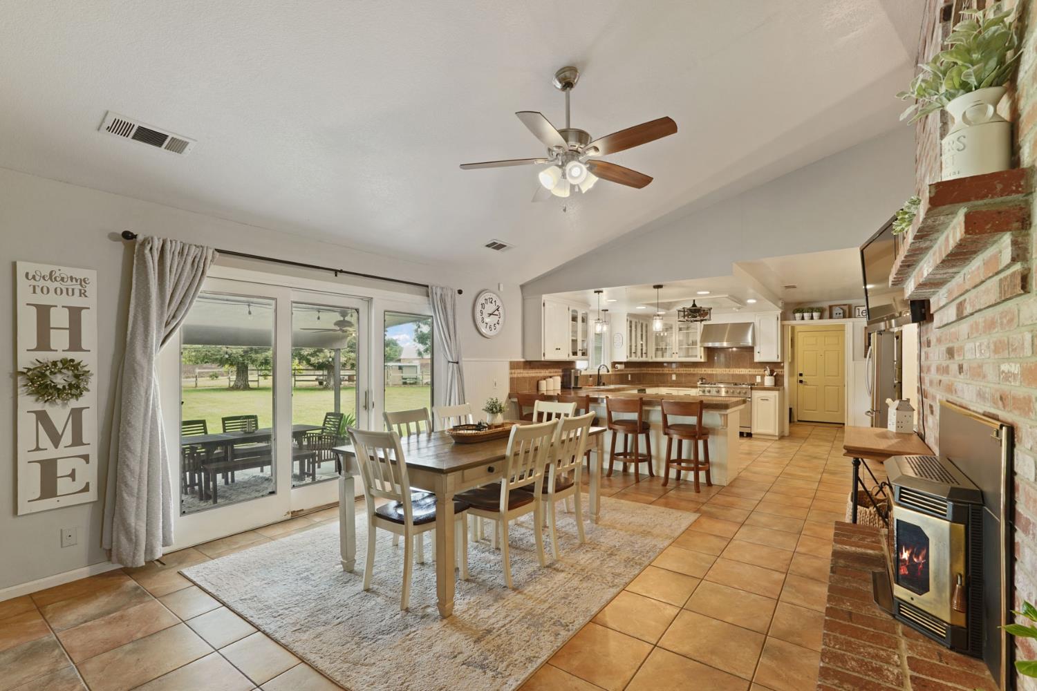 12963 Spring Time Lane Galt, CA 95632 - Photo 21 of 49 a view of a dining room with furniture window and outside view