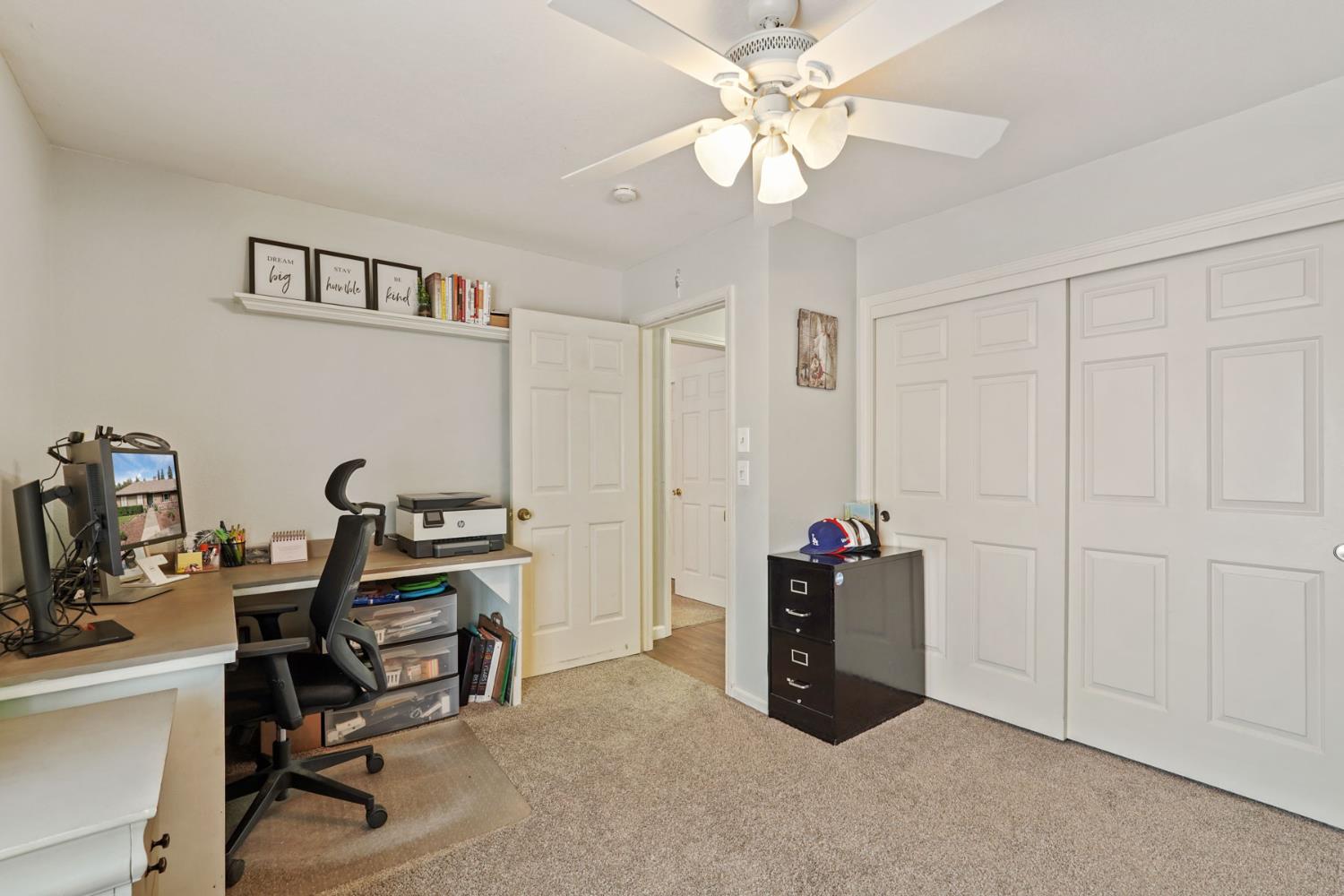 12963 Spring Time Lane Galt, CA 95632 - Photo 27 of 49 a view of a workspace with furniture
