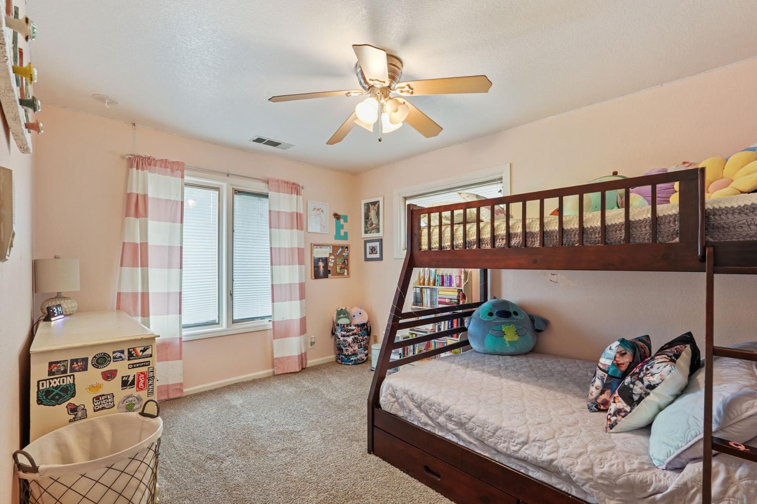 12963 Spring Time Lane Galt, CA 95632 - Photo 28 of 49 a bedroom with furniture and a window