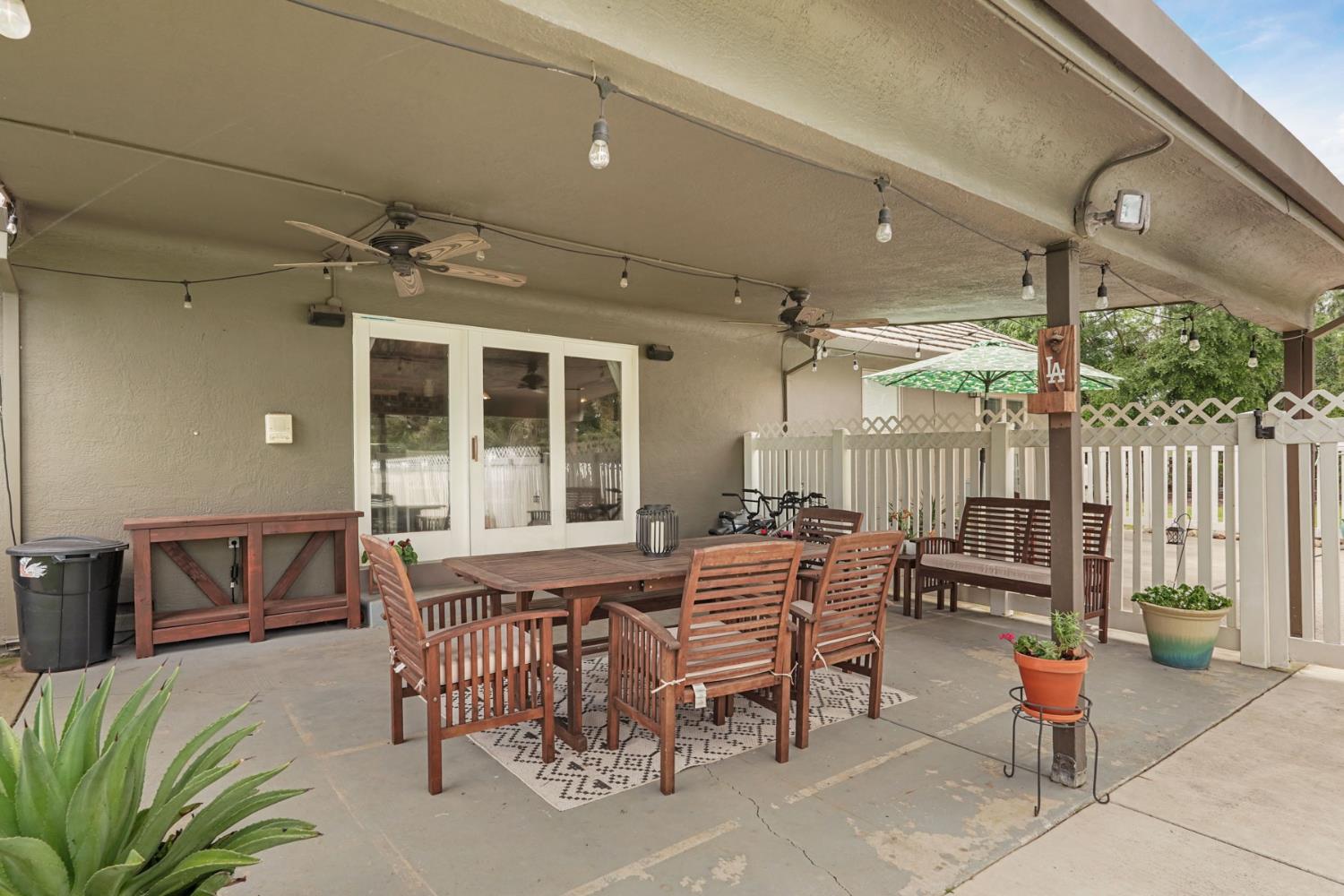 12963 Spring Time Lane Galt, CA 95632 - Photo 38 of 49 a outdoor space with lots of tables and chairs