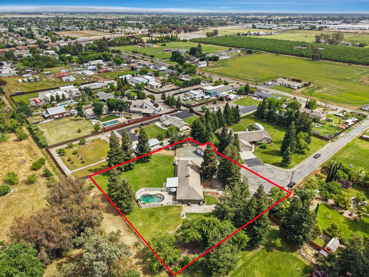 12963 Spring Time Lane Galt, CA 95632 - Photo 46 of 49 an aerial view of residential houses with outdoor space