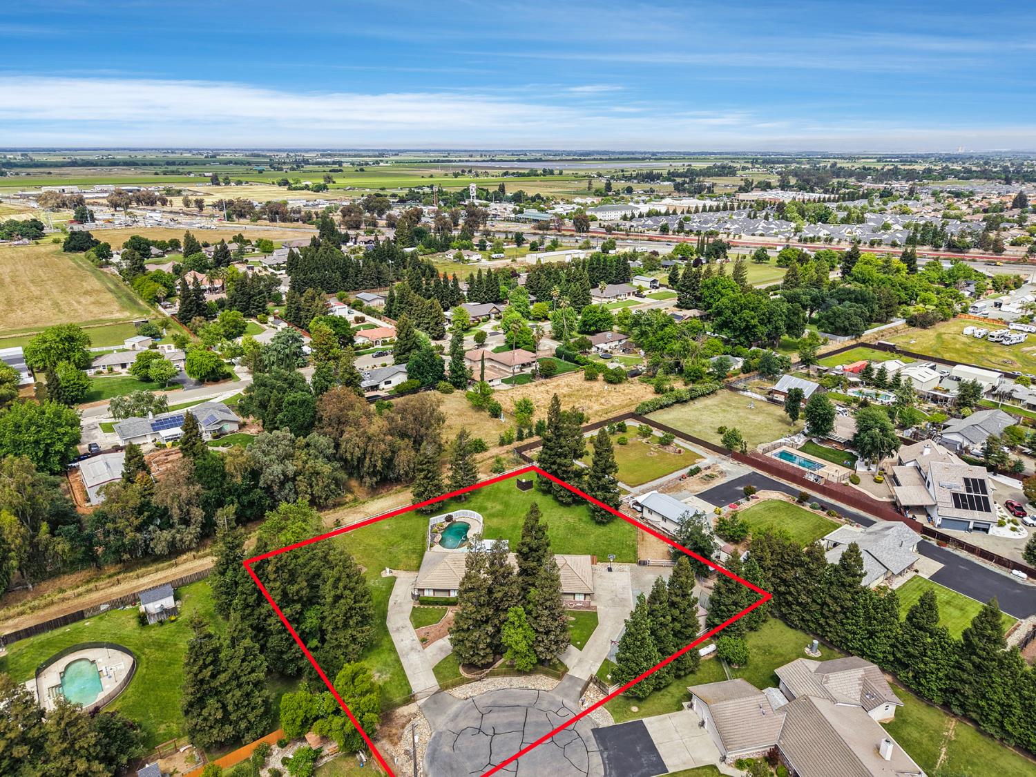 12963 Spring Time Lane Galt, CA 95632 - Photo 48 of 49 an aerial view of residential houses with outdoor space