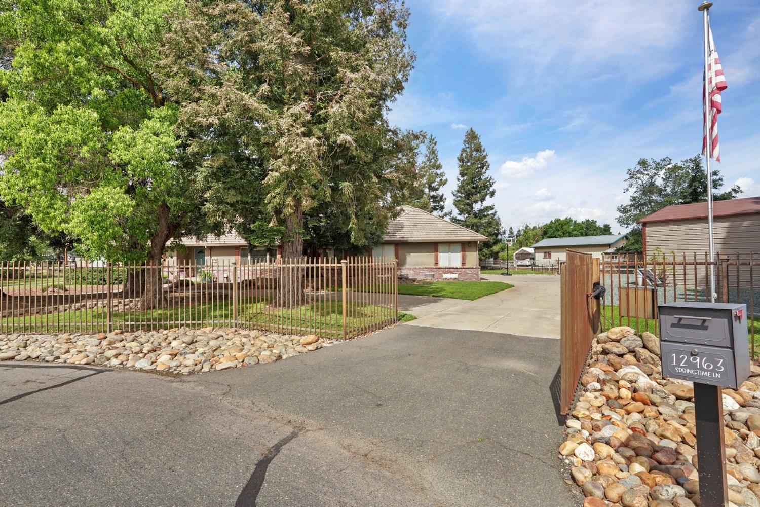 12963 Spring Time Lane Galt, CA 95632 - Photo 6 of 49 a view of swimming pool with a patio