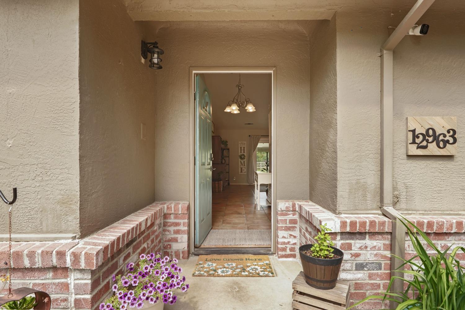 12963 Spring Time Lane Galt, CA 95632 - Photo 10 of 49 a front view of a house