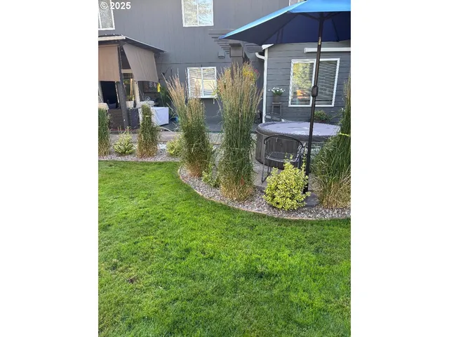 a view of a porch with a yard