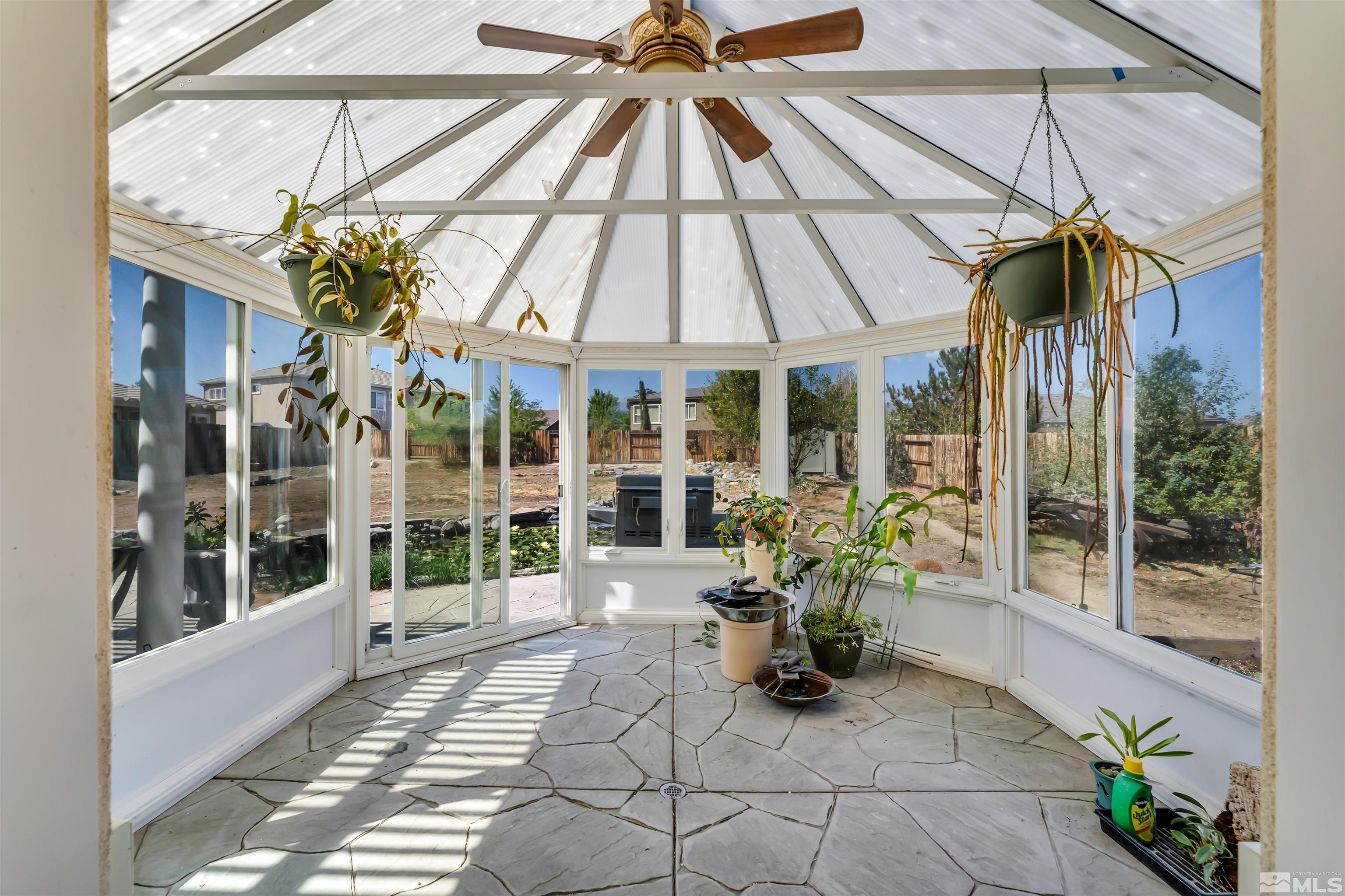 10555 Dillingham Drive Reno, NV 89521 - Photo 21 of 34 a view of a house with sitting area and garden